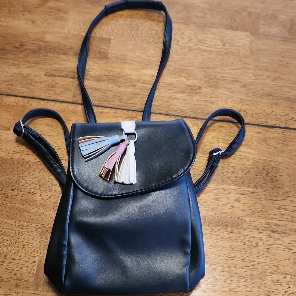Sleek Black Convertable Backpack Crossbody Bag